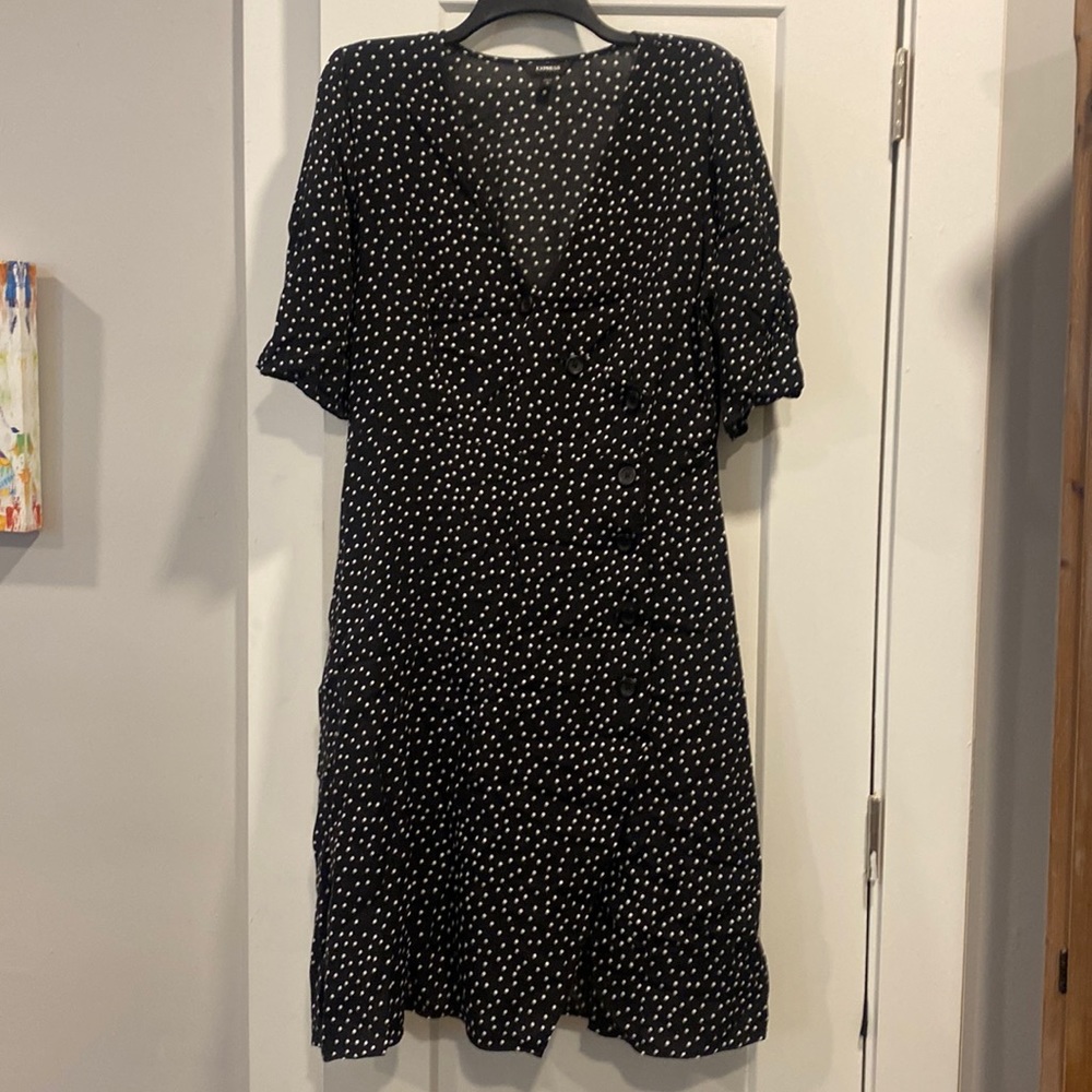 Beautiful Express black polka dot MIDI dress. Gently used. Cute button detailing